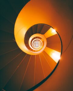 orange and brown spiral staircase
