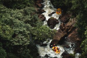 people rafting in the river
