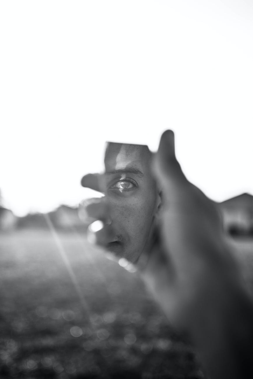 grayscale photo of human hand